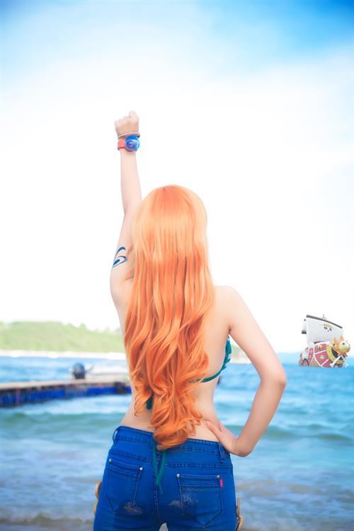 娜美大姐头Cosplay[花心]
cn:  莲小玉  staff 摄影：鞘師的KIRABEN 化妆：魚丸小白子 后期：鞘師的KIRABEN
bcy.net/coser/detail/11972/251899